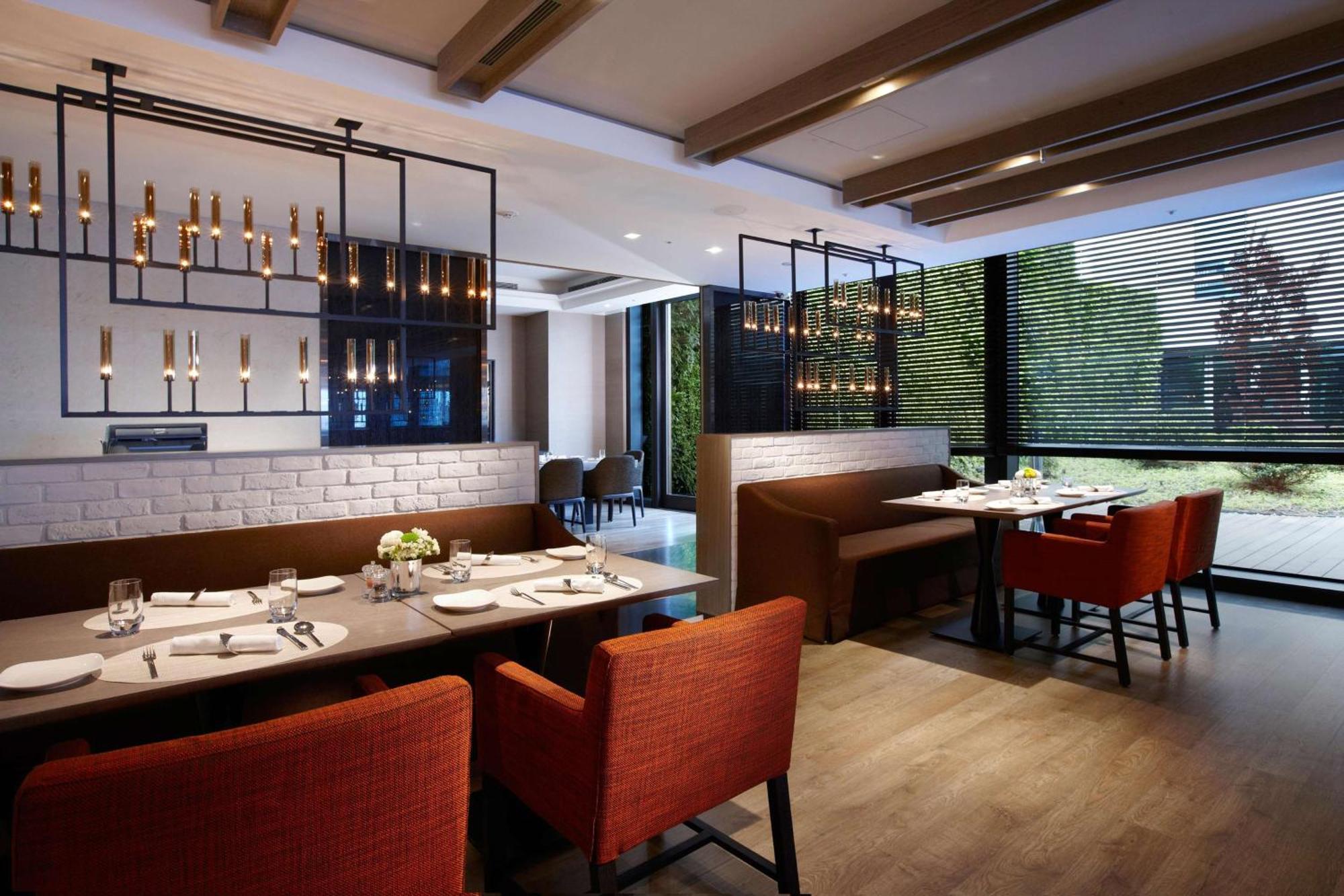 Hotel Humble House Taipei, Curio Collection By Hilton Esterno foto The interior of the restaurant